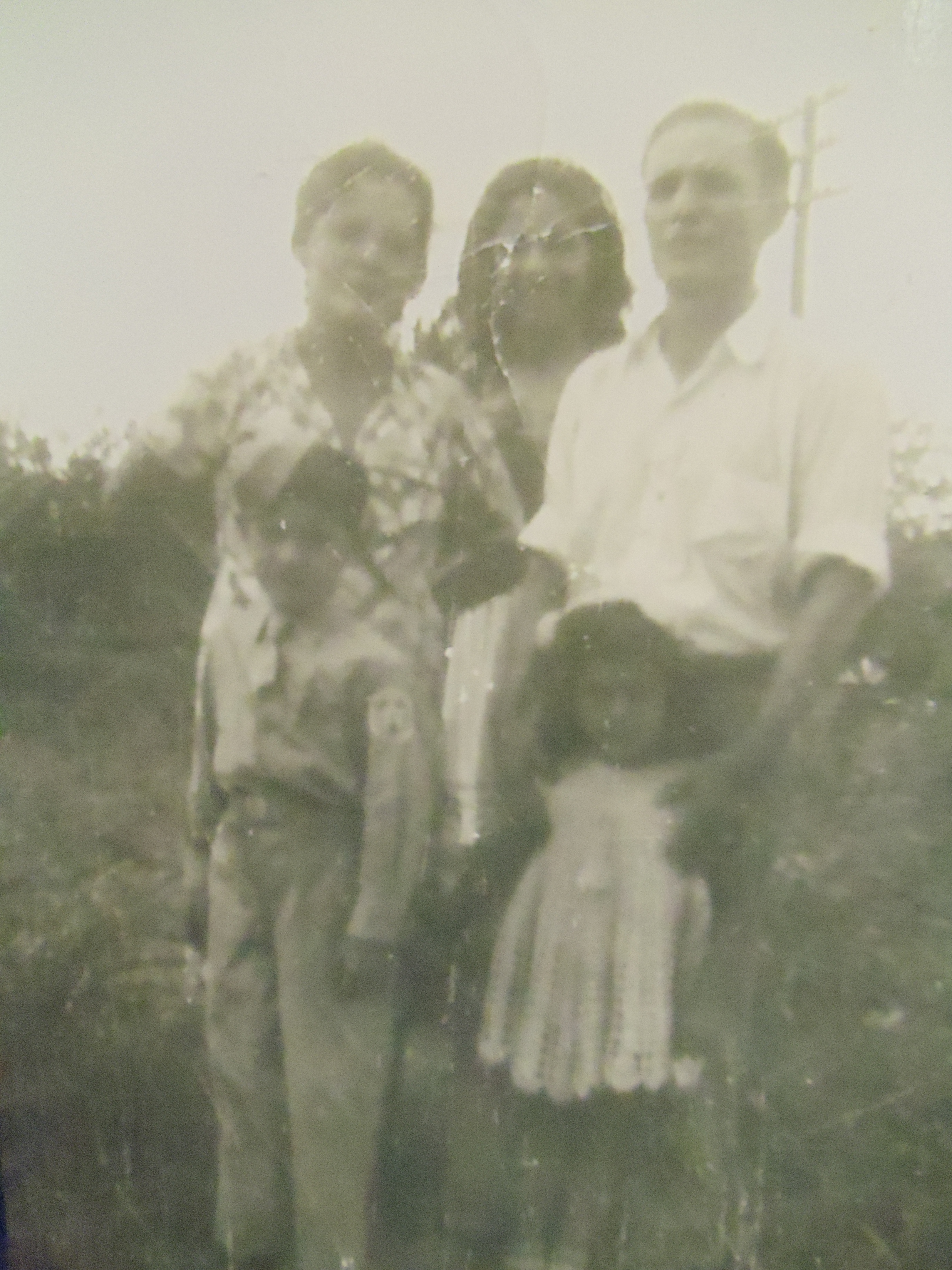 My Father and his Parents with his two sisters (Dolores and Virgina).