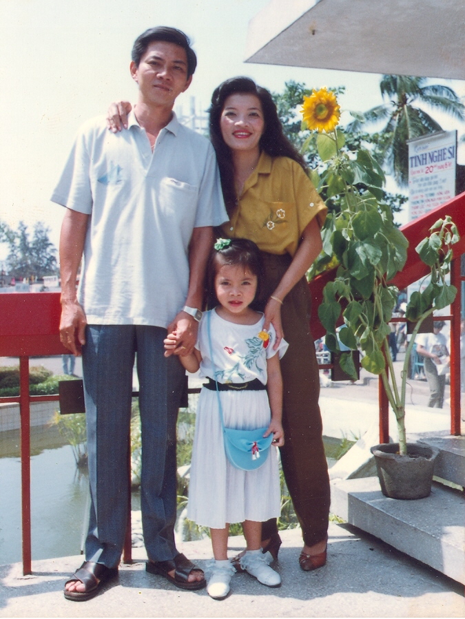 Nhat Nguyen, Thuong Nguyen, Thu Le on New Year's Day in front of Qua Binh(theater) of Sai Gon, Viet Nam (1993)