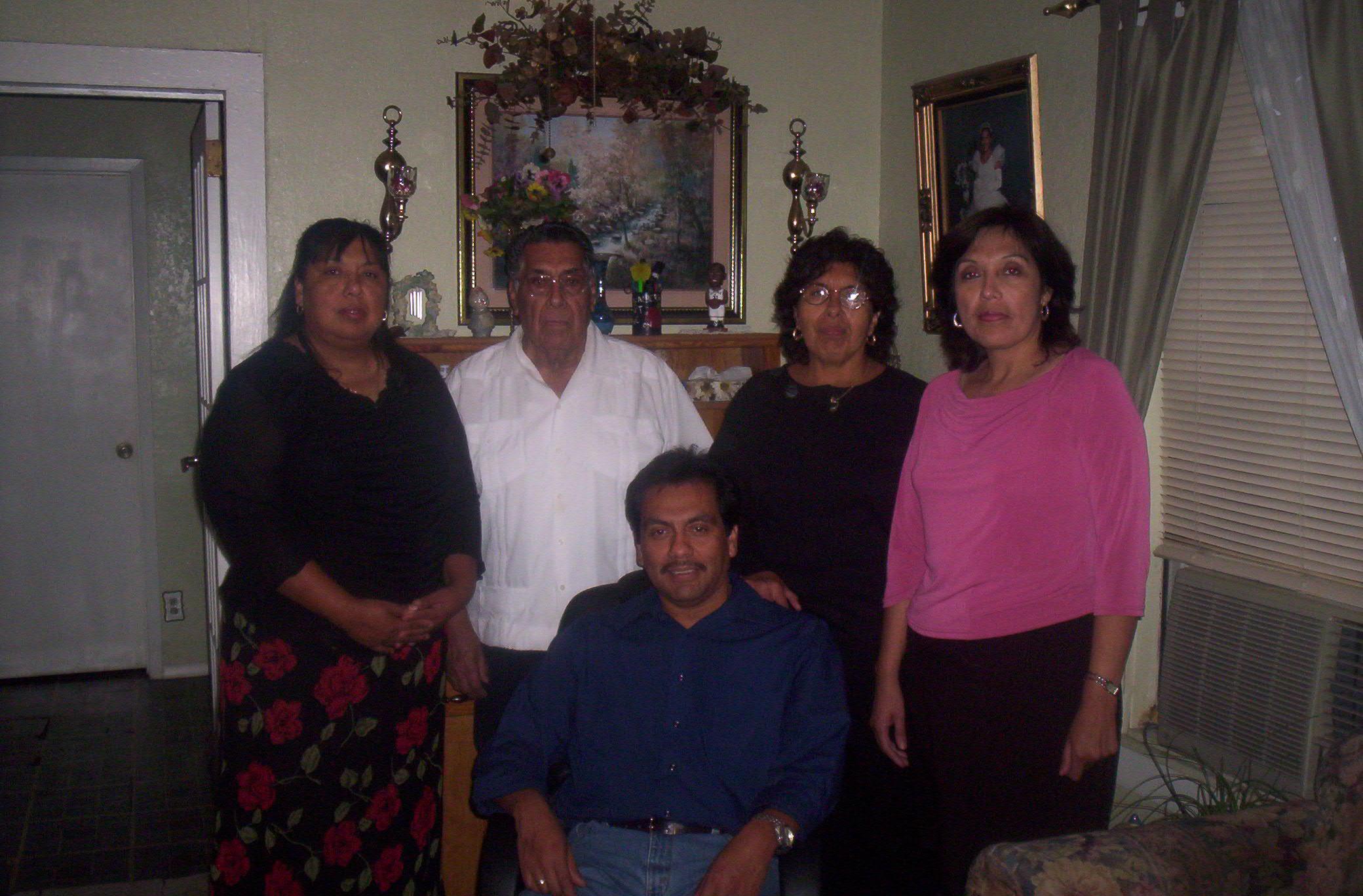 Garciela, Carlos, Soccoro, Idalia, and Juan (sitting down)
