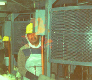 Cesario Hernandez washing vegetables in Milwaukee early 1990's