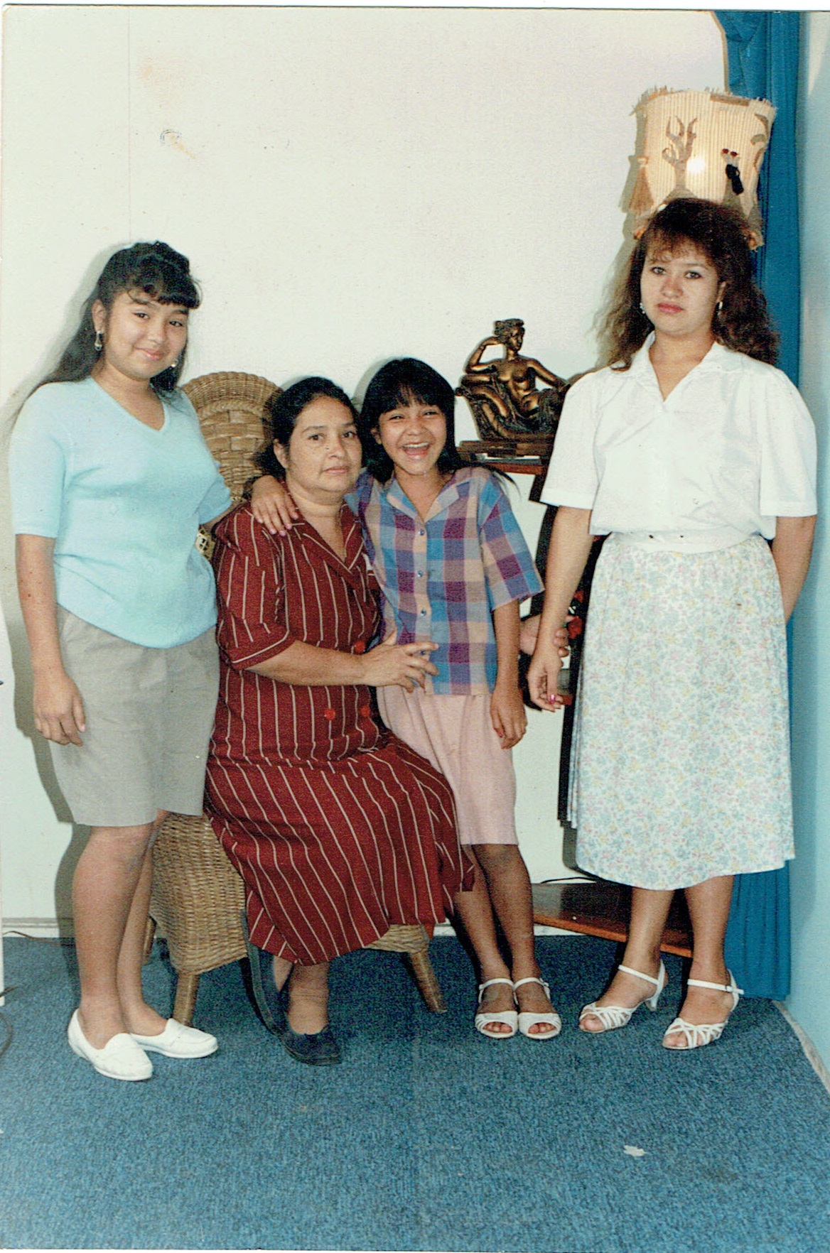 Ana Gloria Huezo with her daughters in El Salvador