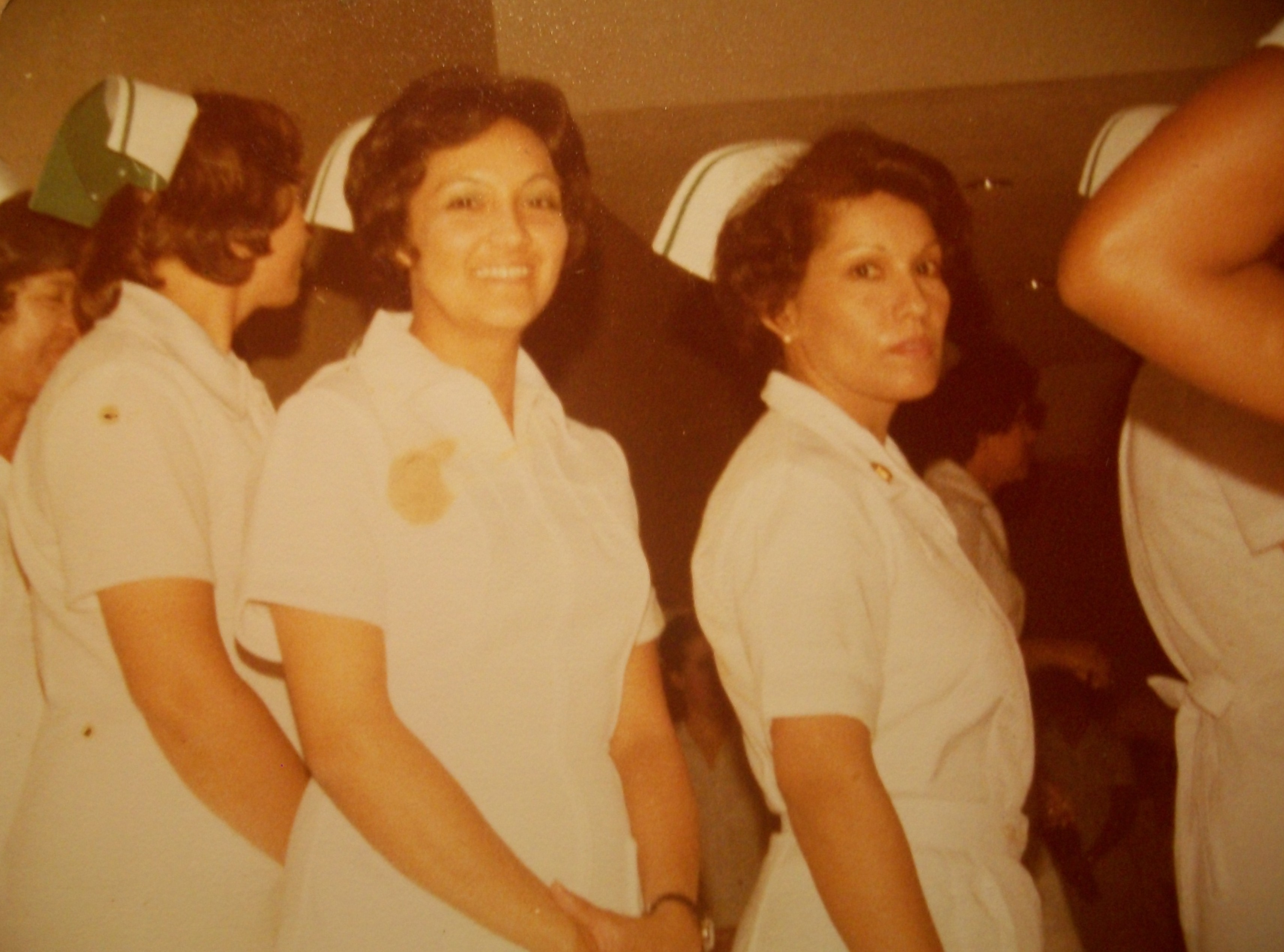 Oralia Martinez crossing the stage at her nursing school graduation