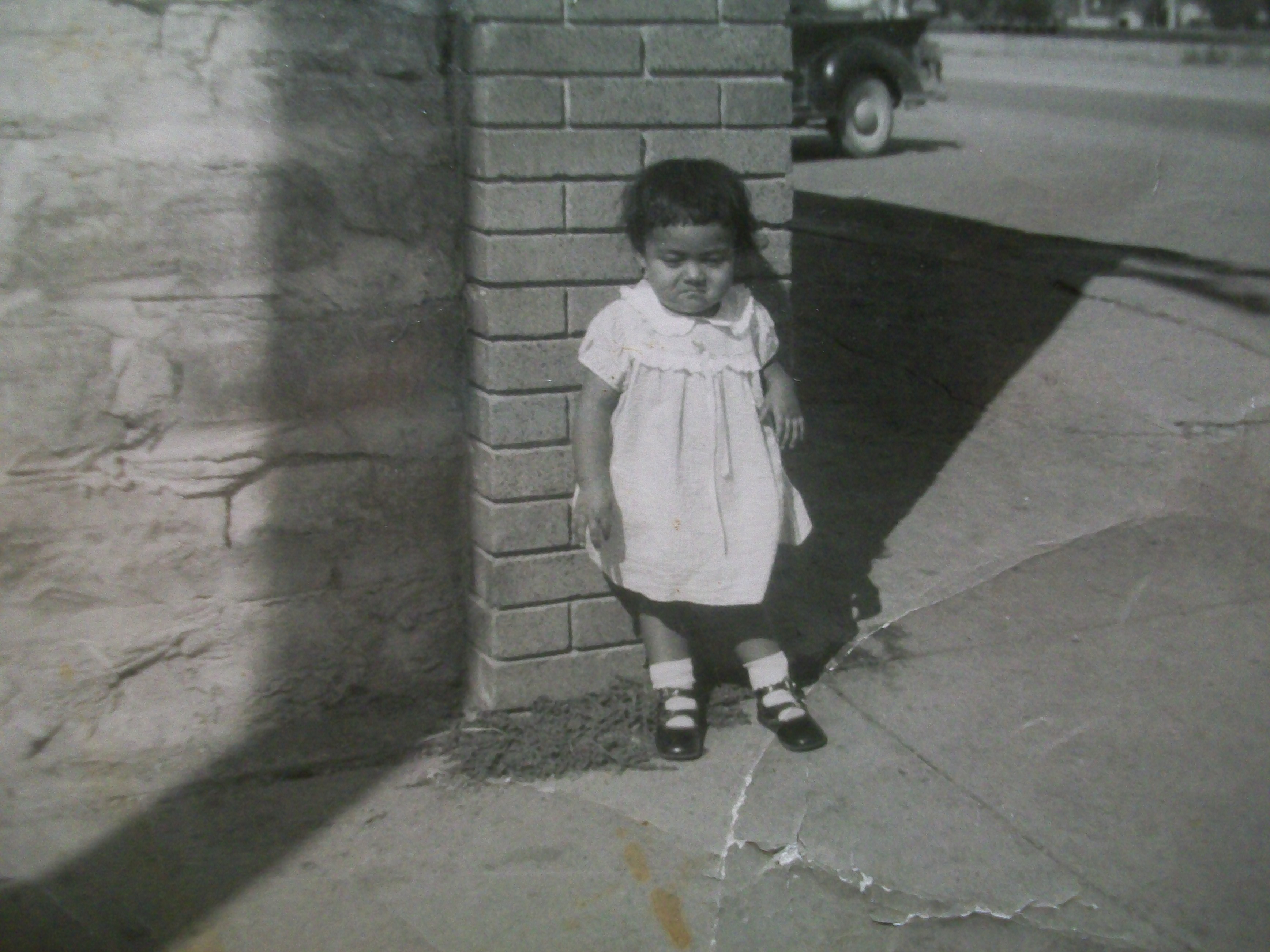 Oralia at the age of 3 making a sad face.
