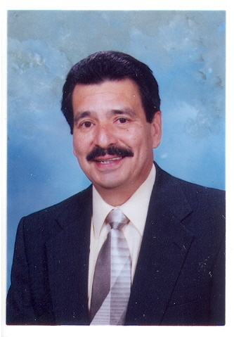 This picture was taken by Fox Tech High School while he was Vice Principle in 2004