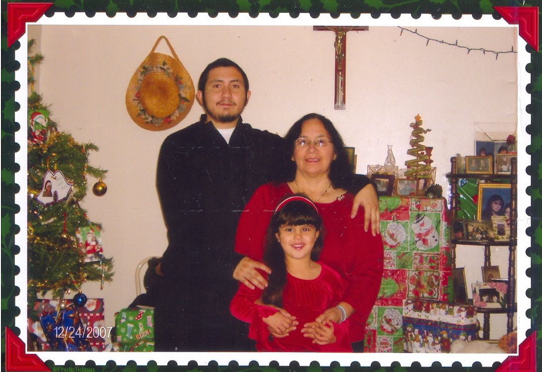 Theresa de Leon and her sons, John and Briana, Dec. 24, 2007 in her house at N. Elmendorf st.
