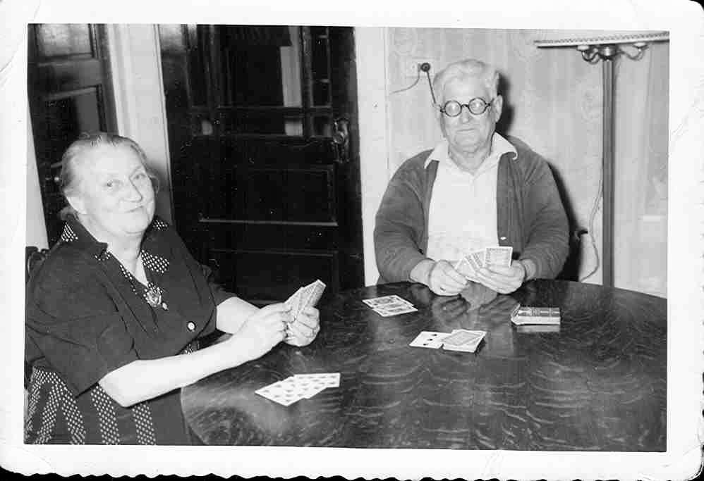 Audie's grandparents, Jim and Annie Belrose, playing rummy.