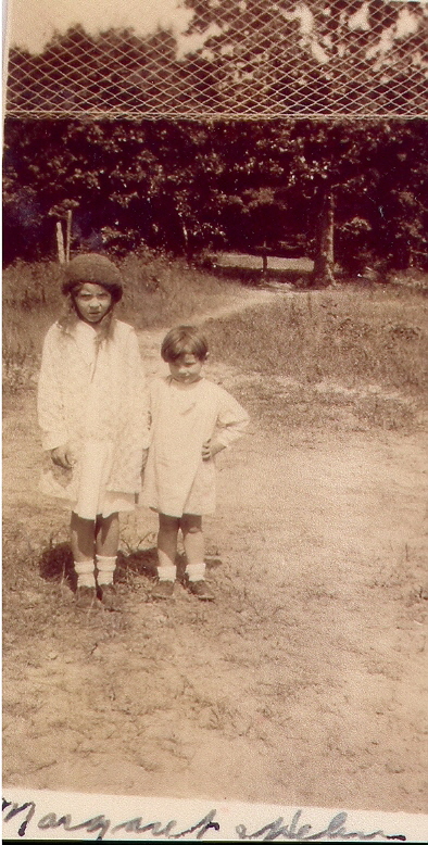 Margaret and little sister Helen at the Mountian Flower school house in 1930