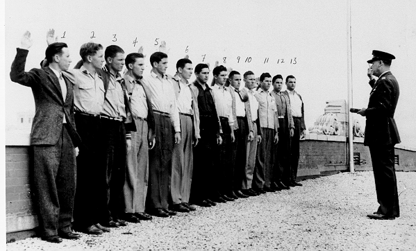 Enlisting:  Thirteen young men of Weslaco High School enlisted together into the United States Marine Corps in 1943.
1. Sam Magee 2. Leo LaDuke 3. Ben Guess 4. Carl Cole 5. Leo Ryan 6. Pete Hall 7. Billy Burger 8. Bobby Walker 9. Carl Sims 10. Harlon Block 11. Glen Cleckler 12. Robert Sooter 13. Billy Jack Robertson.
Harlon Block was one of the men who raised the flag in Iwo Jima. A park is located in Weslaco city in memory of Harlon Block.