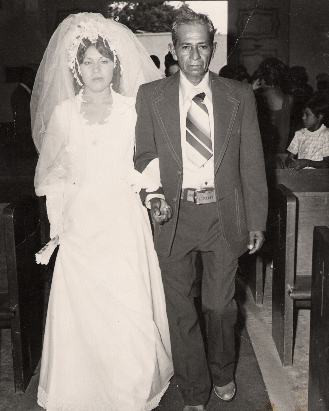 Cristobal Castillo escorting his daughter at her wedding