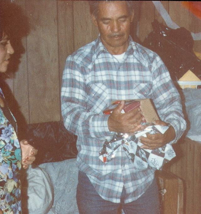 Manuel, opening a gift, At his son house, 1992