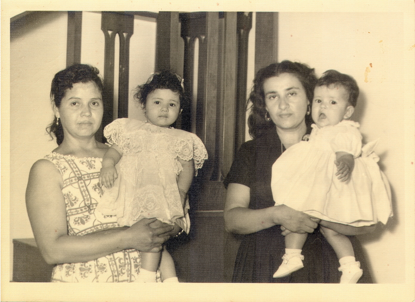 Maragret (left age 33) holding daughter Laura (age 1), with sister- in law (rigth)holding cousin. 