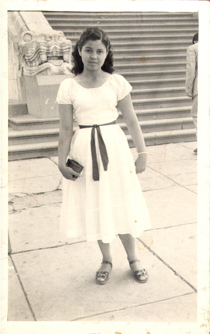 Margaret in front of library after getting off of work. Age 16