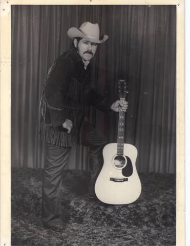 This is frank in a pose with his guitar in the 80's he sometime likes to sing and imitate the singer El Piporro.