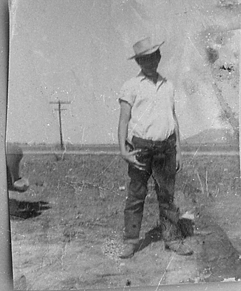 This is Frank age 12 in Littlefield, Texas picking cotton