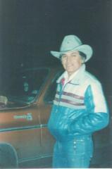 Teofilo next to a brand new Chevy Silverado. (1980)