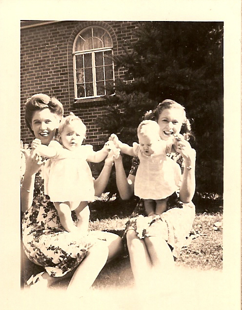 Willie Mae Gates holding first-born child, Lynell, with her cousin holding her own daughter in Colorado