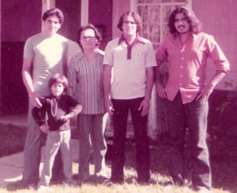 (From left) Dad, Some kid i don't know, dad's mom(i think), Uncle Manuel, Uncle Fernando standing in front of their house, 1970's
