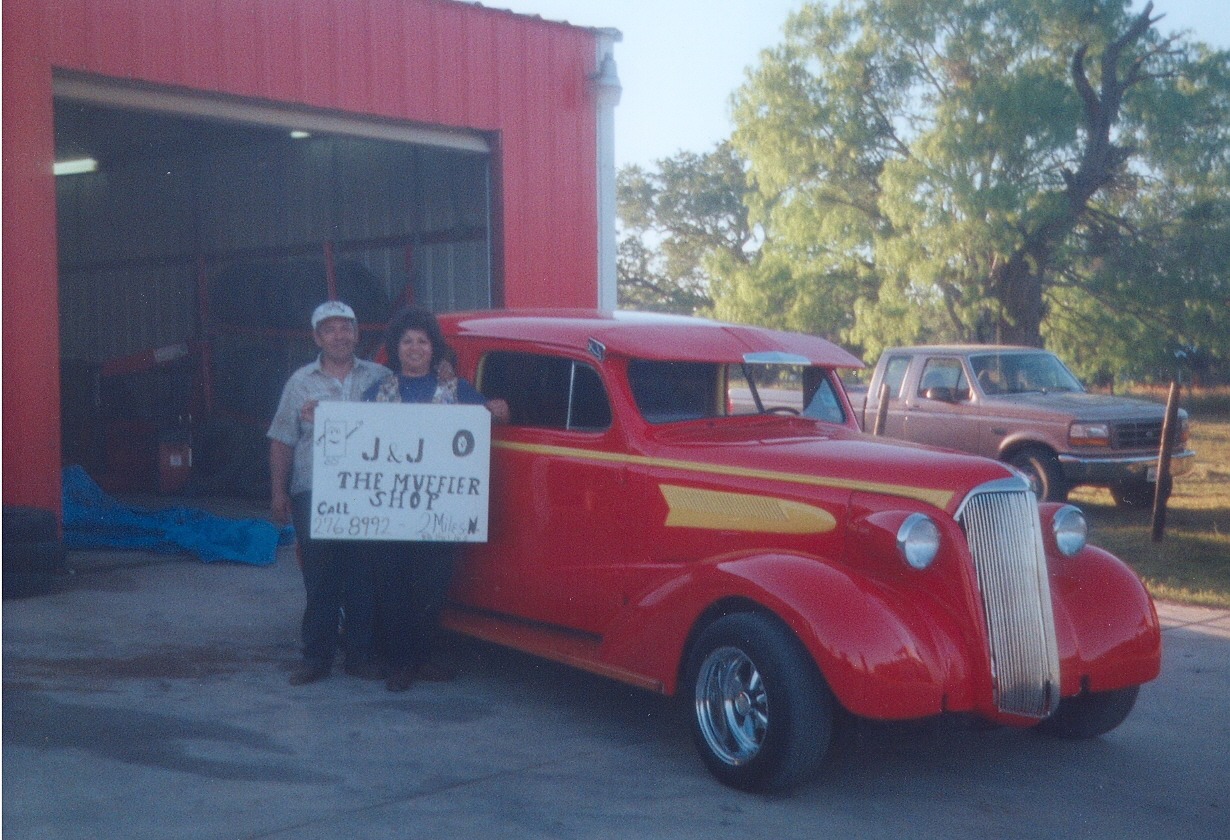 Joe and Julia Llanes at Joe Julian Muffler Center in Poteet Texas, April 7, 1996