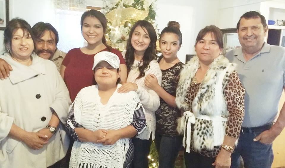 Reynaldo Jimenez and family.  Reynaldo on right.- Xmas 2014