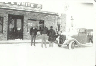 Felix Pawlik (Father), Pete Pawilk (Brother) and Conrad Lyssy in front of Red & White Grocery in Kosciusko,Texas. February 1940.
