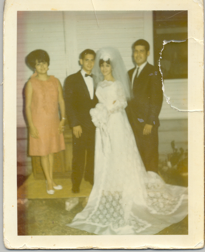 Estefana and husband Armando on their wedding day at his mothers house with his sister Josie and her husband Jimmy
