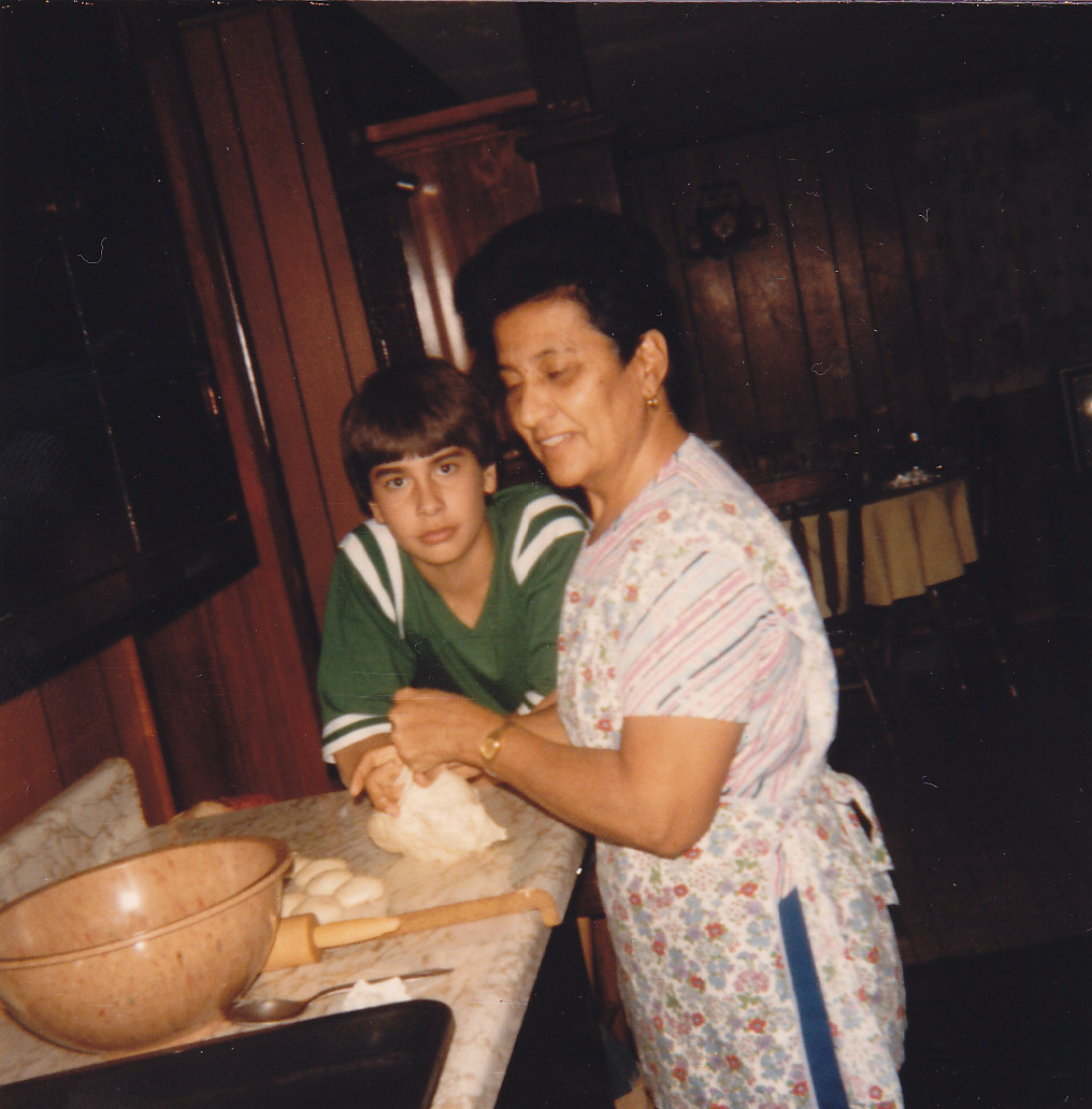 Consuelo and grandson Carlitos making flour tortillas 1981