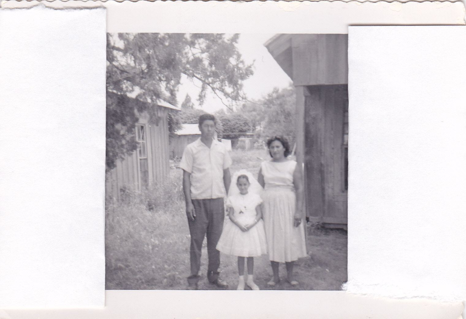 Leo,Consuelo, and their daughter Sylvia at her 1st communion 1958 Somerset, TX
