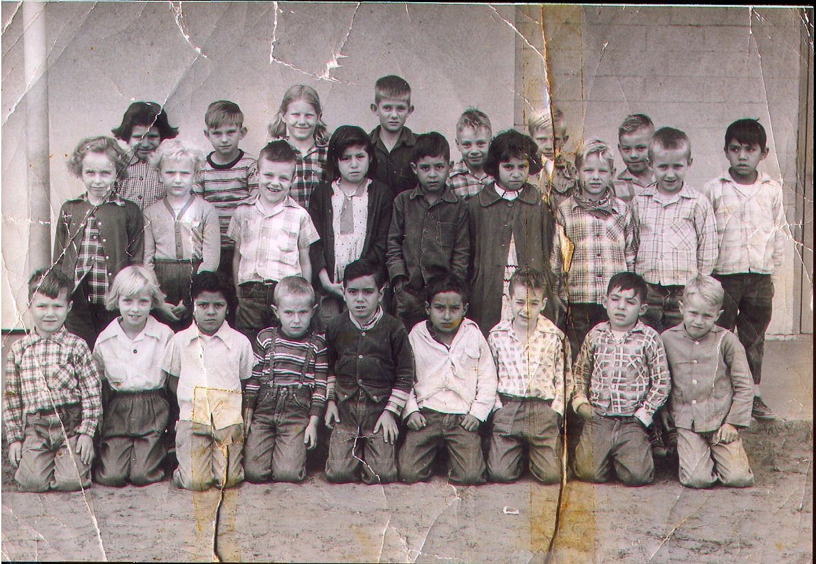 Aurora Morales, bottom row 3rd from left,1st Grade,1954,