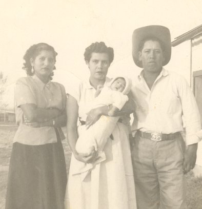 Augustina holding her daughter Rosa, to the left is her sister-in-law Feliz Rosales Menchaca, and on the right is her husband Jesus Rosales in 1952