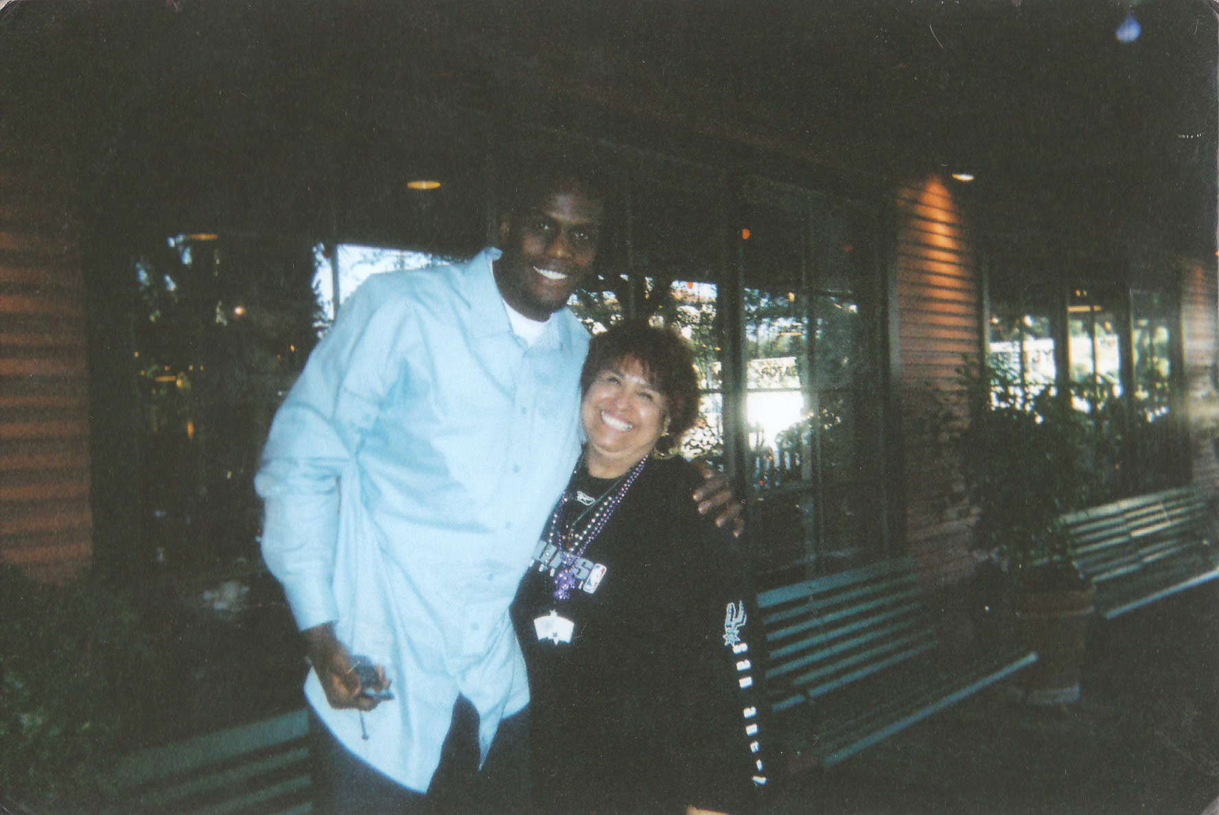 Rosa and Former San Antonio Spur Malik Rose April 14, 2004. They are standing outside of a restauraunt called Pappadeaux