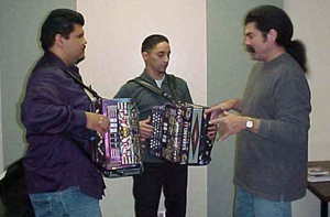 Conjunto students Richard Cano and Chris Perez take private lessons with Juan Tejeda, Conjunto instructor. Photo by Michelle Tyler