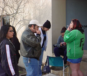 Palo Alto students take a smoking break outside of the Student Center/Cafeteria 