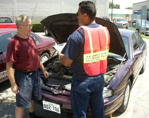 Click to enlarge image: ACCD courtesy patrol helps out a student.