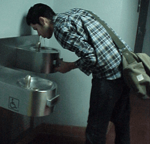 Photo: Student drinking from water fountain