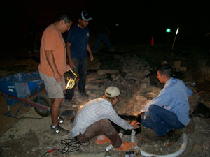 Click to enlarge photo: PAC landscaping students at work.