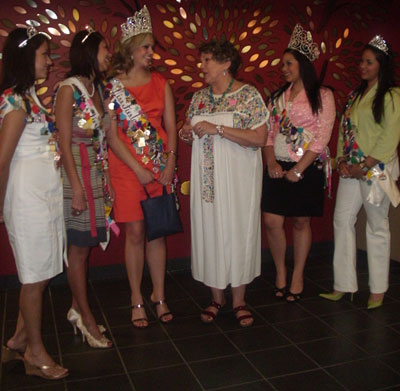 Dr. "Cha" Guzman greeting Fiesta royalty