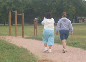 Beatrice Rivas and Rosalinda Vivey use the walking trail at Palo Alto. Photo by Melinda Ivy
